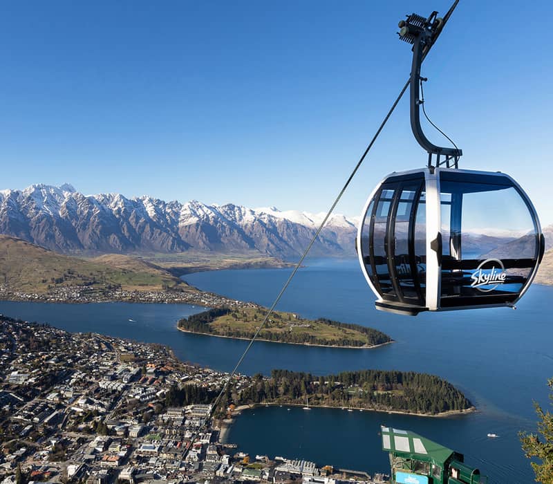 Queenstown gondola view over Lake Wakatipu and Remarkables mountains.
